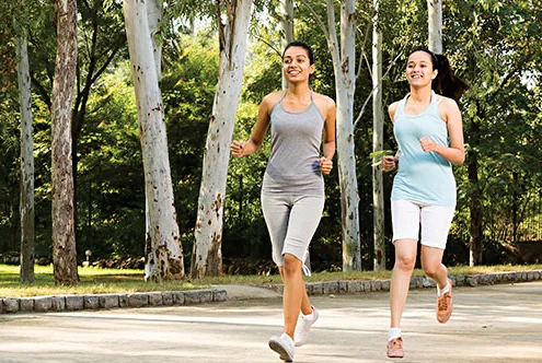 Landscaped park jogging track amenity — representative image