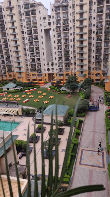 Suncity Heights — Towers & Landscaped Courtyard